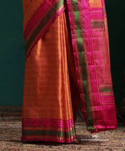 Load image into Gallery viewer, Burnt Orange Pure Silk Kanjivarm Saree With Zari Stripes And Pink And Green Border With Rudraksh Motifs
